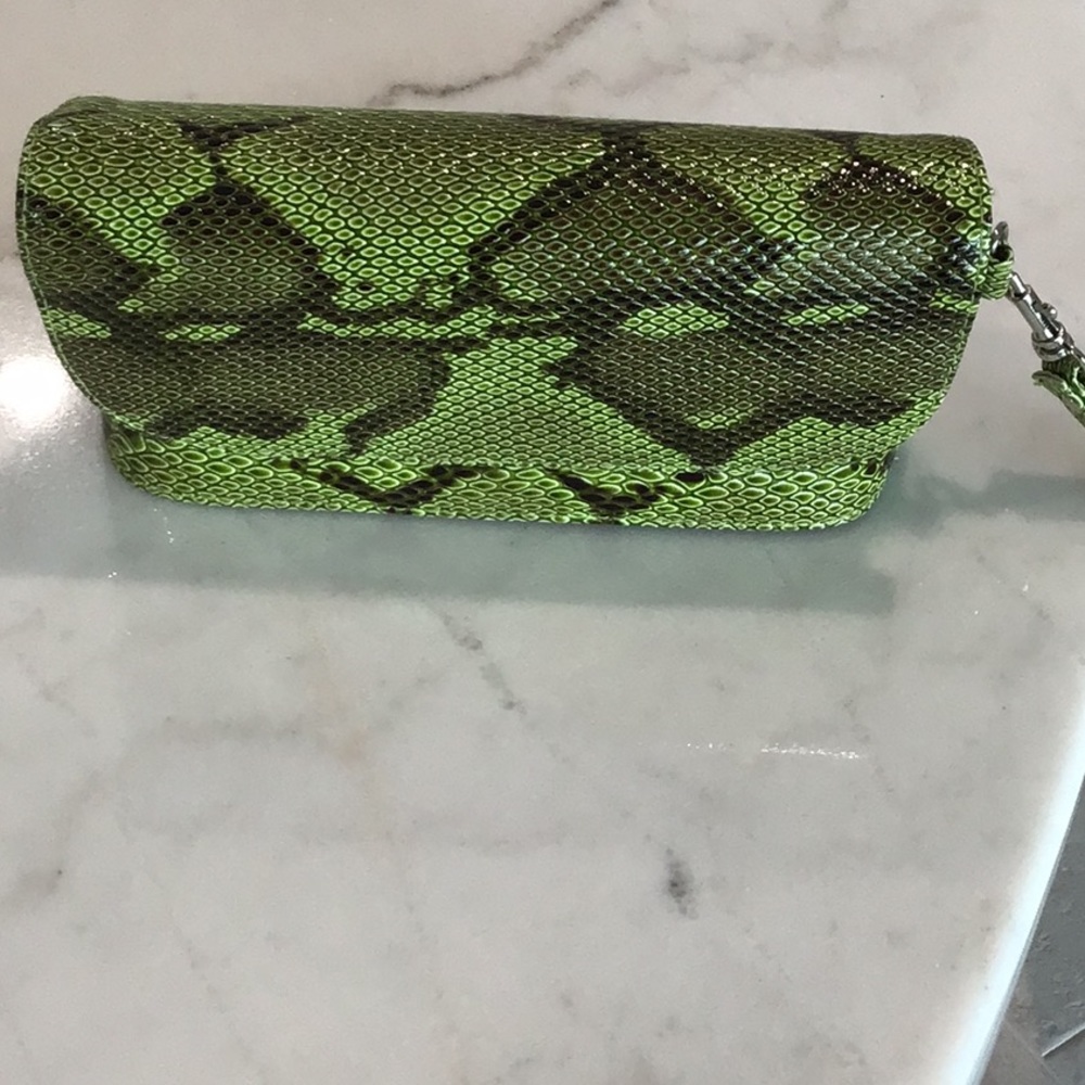 Elegant snakeskin look clutch. New